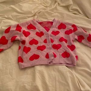 Pink hearted sweater, previously loved